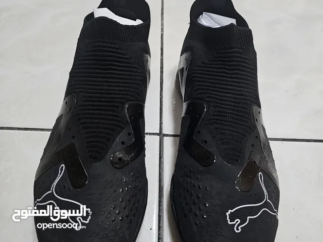 حذاء كرة قدم من بوما (ألترا ماتش) اللون الأسود