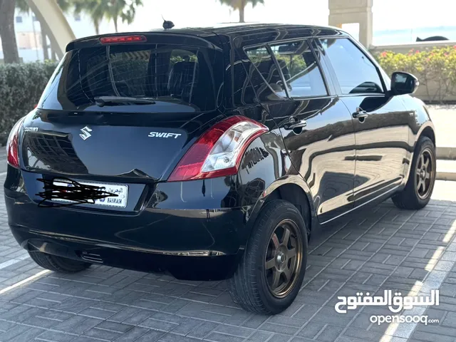 Swift 2015 black car