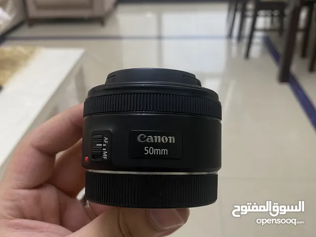 Canon 50mm EF LENS F/1.8  simple use عدسة كانون 50 mm استعمال بسيط جدا شبه جديدة .
