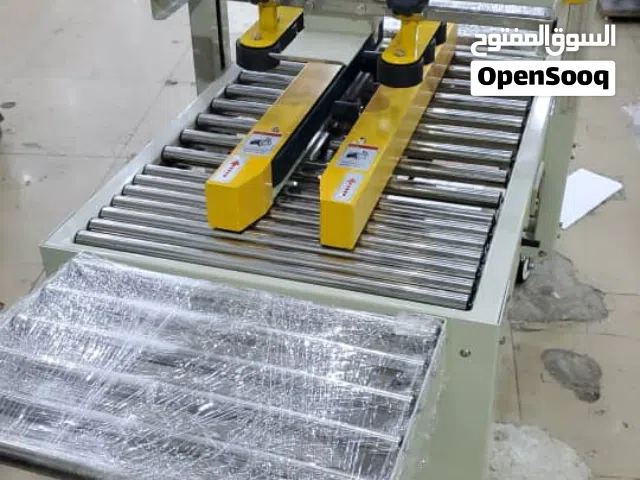 بيع مكينه تلصيق الكرتون جديد 1600 دولار