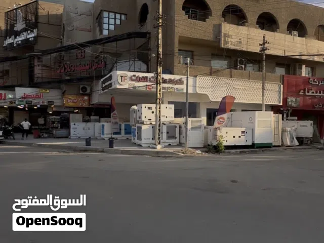 بناية تجاريه ركن للبيع موقع كراده