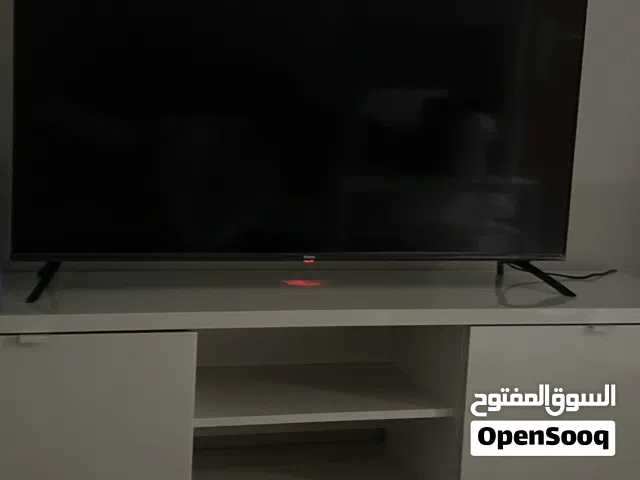 تلفزيون مع طاولة خفيف الاستعمال
