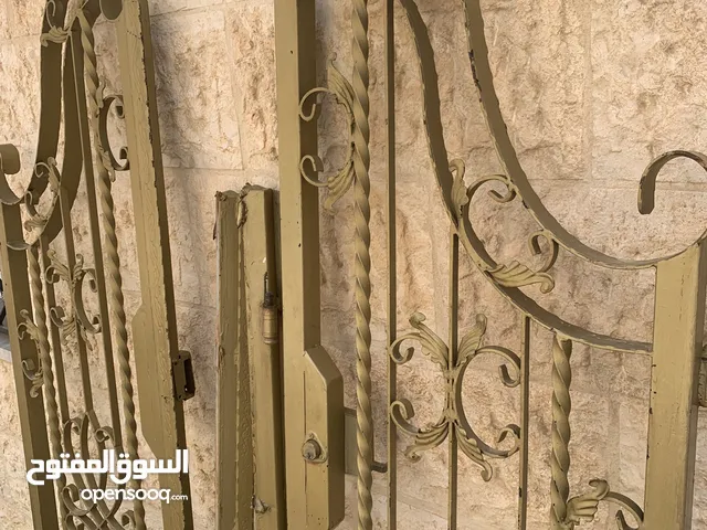 باب حديد خارجي ذهبي للبيع 100 د
