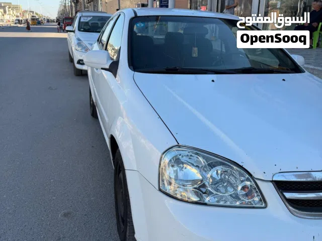 سيارة اوبترا 2012 ابيض للبيع