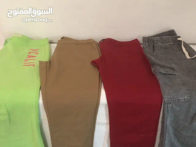 شروة بناطيل ستاتي 25 بنطلون ماركات عالمية شبه جديد بحال الوكالة للبيع