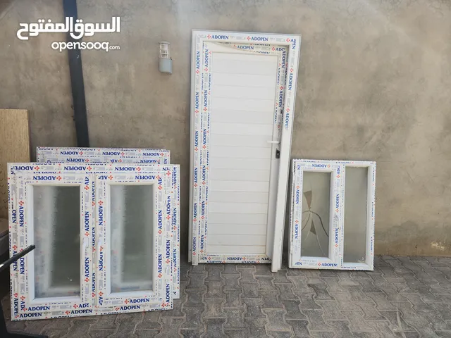 أبواب خشب ونوافذ المنيوم وباب رئيسي وغرف