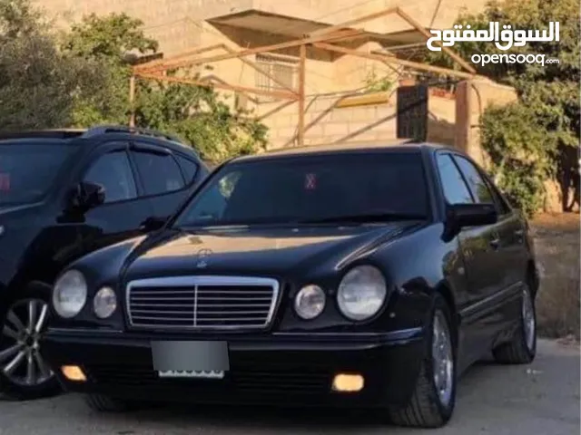 مرسيدس W210