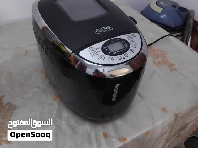 ماكينه صنع الخبز والمخبوزات من الطحين الحبه الكامله