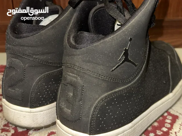 Jordan 1 Flight 5 Premium in black with white soles.