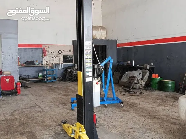 ورشة صالة وميكانيكا للبيع المكان طريق الثقيل مصراته