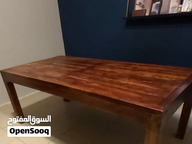 Wood dining table without chairs