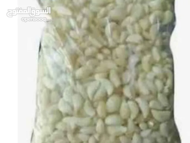 ثوم بلدي طازج مقشر نخب اول مناسب للمطاعم والبيوت يوجد جميع الأوزان