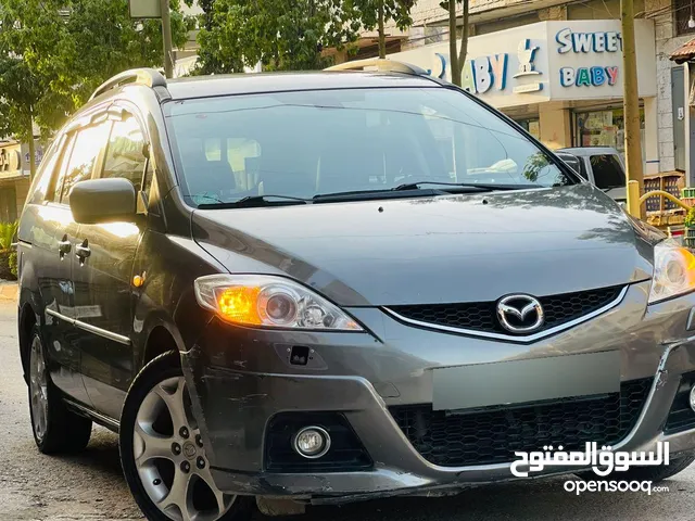 مازدا 5 ستيشن بابين سحاب ماتور 2000cc بدون تيربو هيك بجين هضول كراسي اماميات تدفئه كزاز كهرباء بنزين