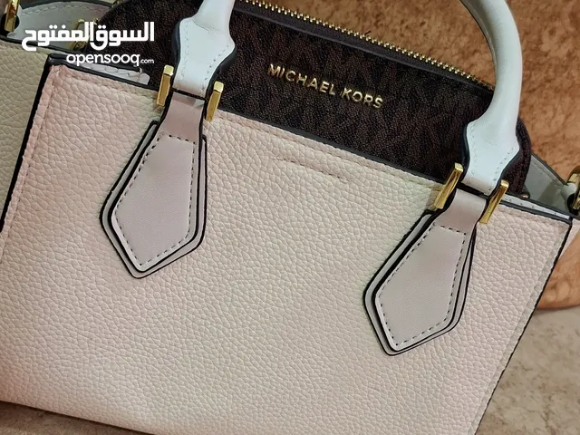 White Michael Kors for sale in Doha