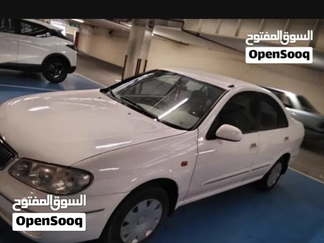 Nissan Sunny 2005 model White color perfect car 100 percentage Masallah.