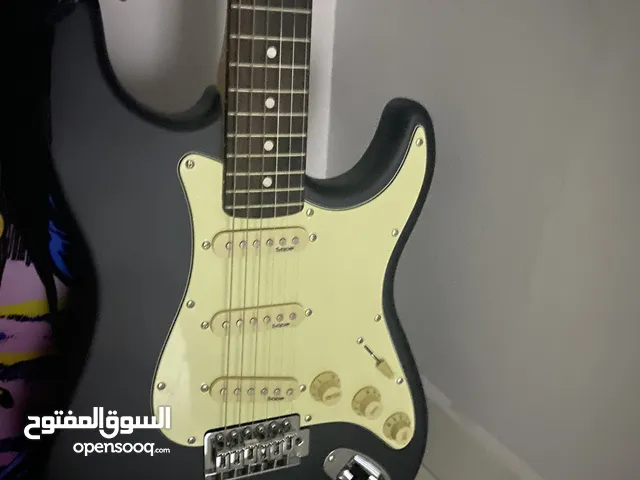 electric guitar with fender amp!