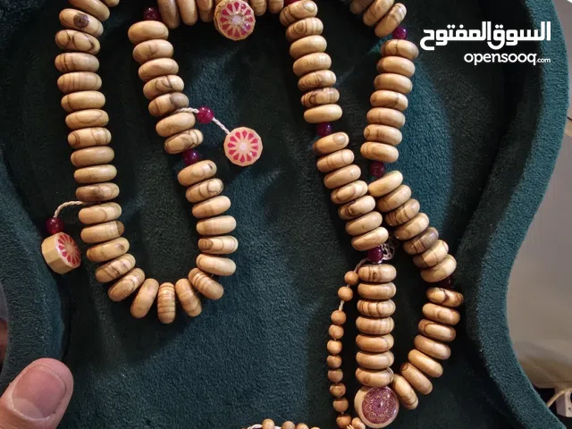 بركة الزيتون.. سبحة الـ 100 حبة بالعقيق الأحمر ينبض بالرقي