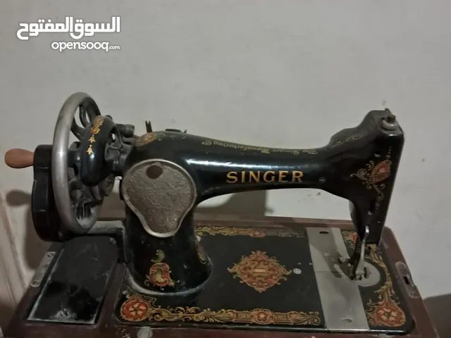 السعر قابل للتفاوض ماكينة خياطة سنجر اصليه منذ عام 1930 لهواة التحف والانتيكات وكل ماهو قيم