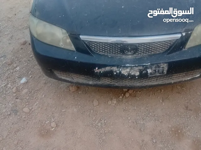 مازدا 323 2002