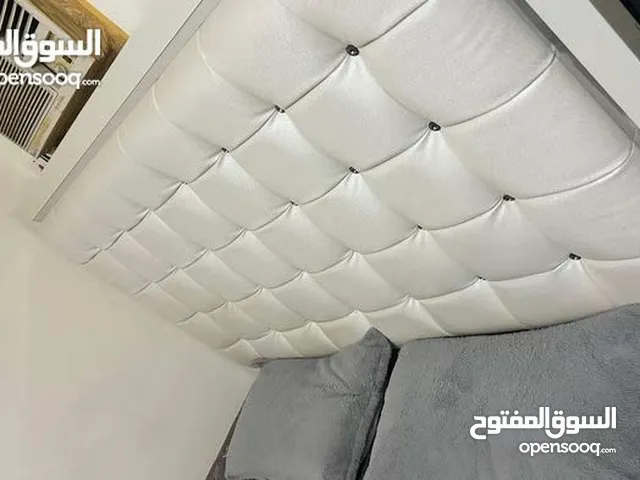 White bed with mattress