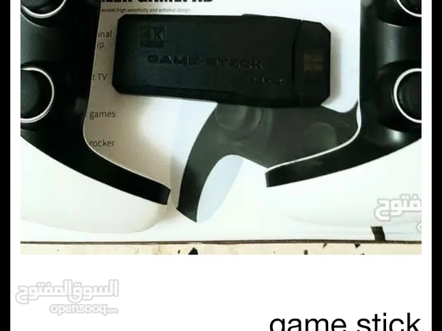 game stick 4K شبه جديد/ أكثر من21000لعبه/ دراعات بلوتوث