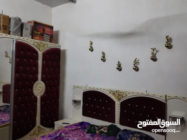 بيت للبيع تجاوز في بغداد منطقة الكفاءات العبيدي مساحه 125 متر مربع 3 غرف كل غرفه 5×4 ومطبخ صغير والط