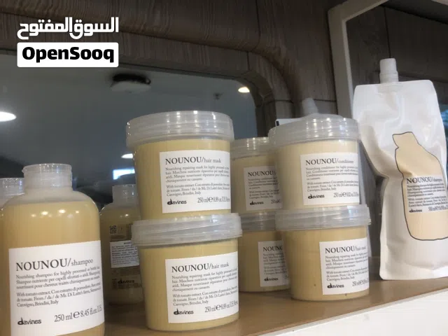 منتجات olaplexوDavines المتخصصه للشعر التاف تشمل شامبو والبلسم المناسبین للاستخدام الیومی