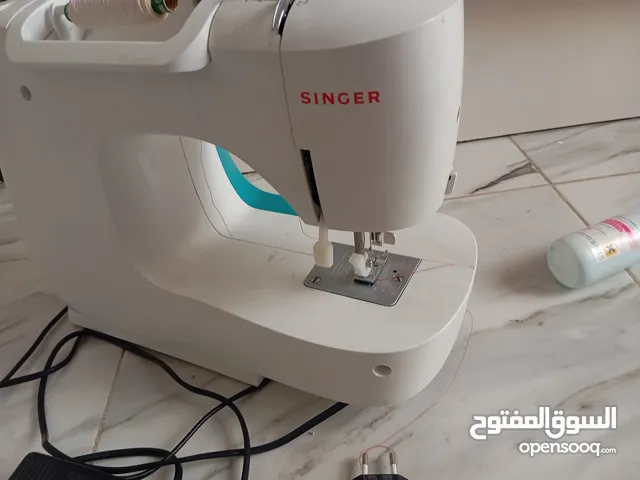 ماكنية خياطة سينجر صغيرة