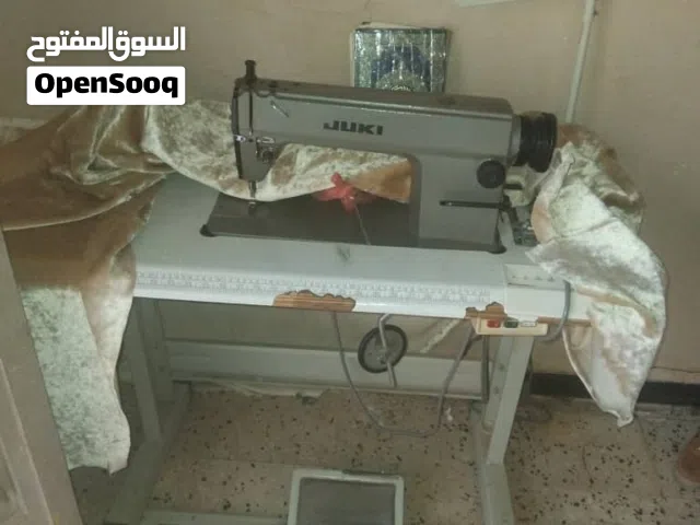 مكينه خياطه ملابس