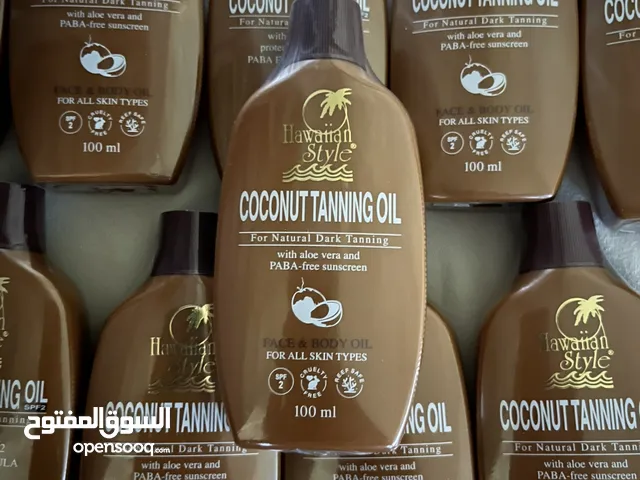 Tropical tan magic : coconut oil for gloden perfection تان الكوكونت للون ذهبي مثالي