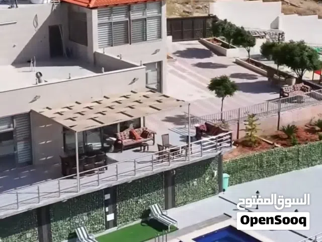 مزرعه وشاليه بسعر حرق للبيع بداعي السفر في أجمل مواقع جرش خلف جامعة جرش يتضمنها شاليه طابقين