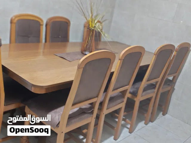 طاولة طعام 8 كراسي بحال الجديد