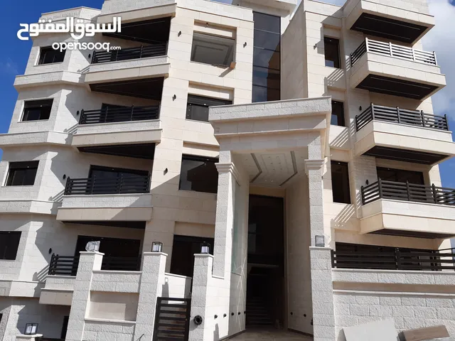 اخر شقة غرفتين نوم في مشروع ربوة عبدون ط ارضي مع كراج خاص و ترس كبير بأقل سعر