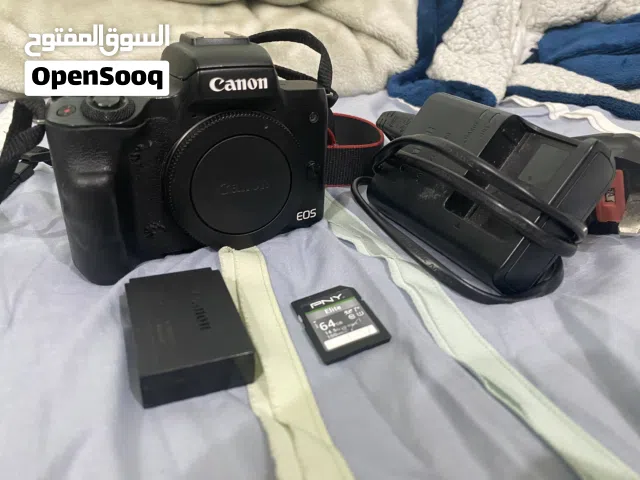 كانون m50 canon  المنتج كما في الصورة معاه بطارية وشاحن وموموي