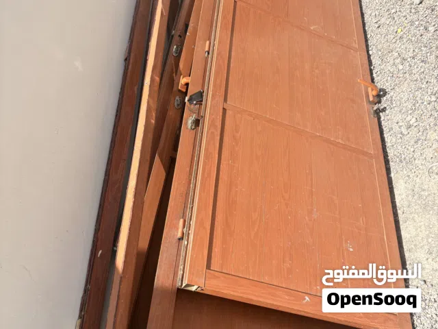 ابواب المينيوم لون خشبي