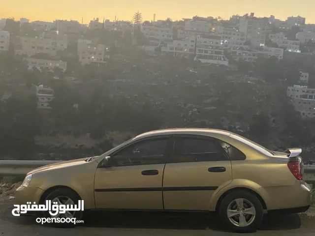 شيفروليه اوبترا 2006 ذهبية