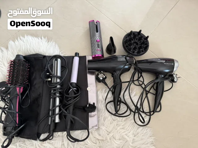 6 hair stylers with 2 hair dryers and their accessories