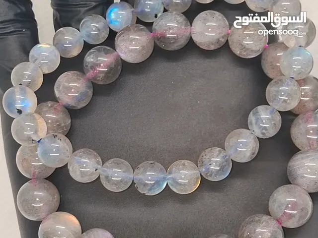 Labradorite rainbow moonstone bracelet اساور حجر الطاؤوس البنفسجي والملون