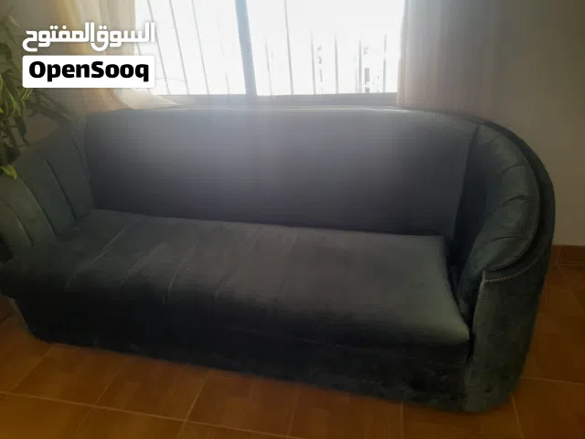 3 - 4 seater sofa in green velvet fabric good condition