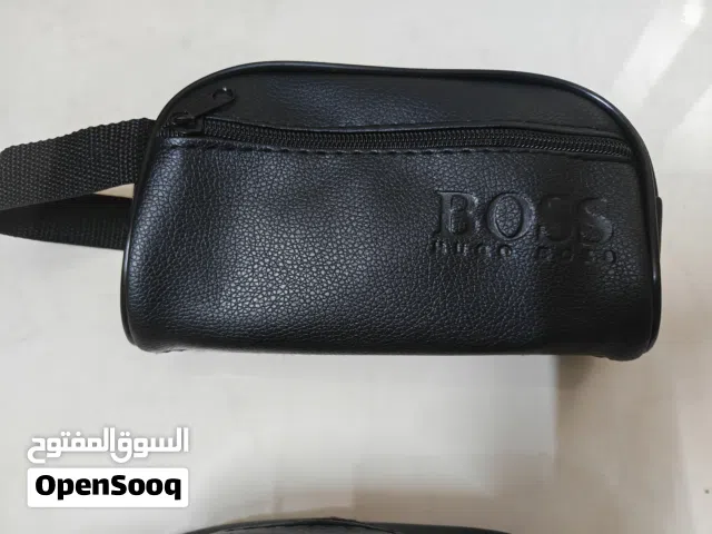 شنط جلد يدوية للهاتف والمحفظه والمفاتيح