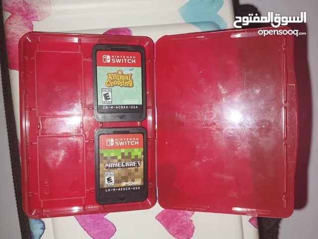 Nintendo switch lite وكالة مع لعبتين