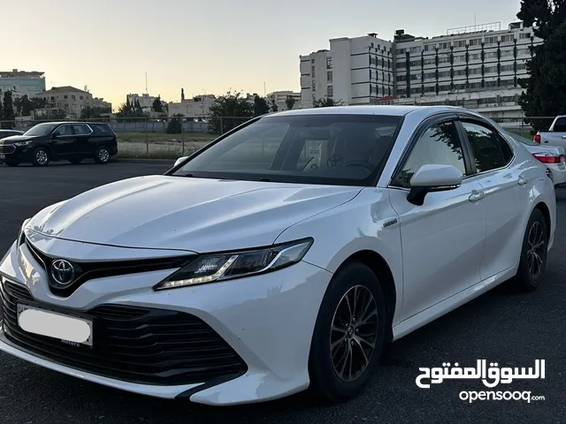 كامري 2020 وارد المركزية( قابل البدل على id4) فحص كامل كرت ابيض ماشية 90 الف صيانة كاملة قبل شهر
