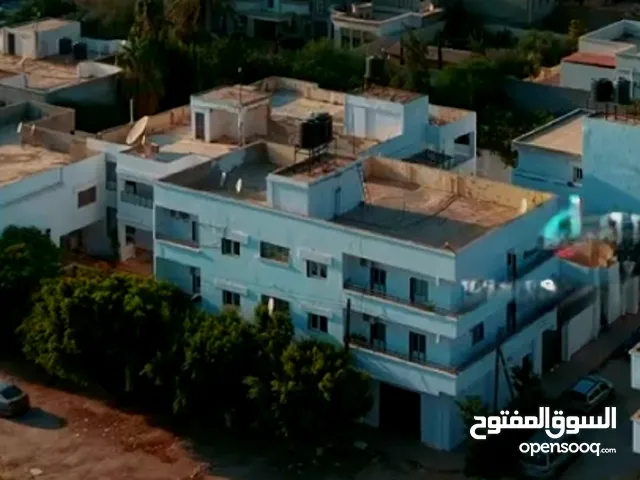 ڨيلا + عمارة +باركى للسيارات