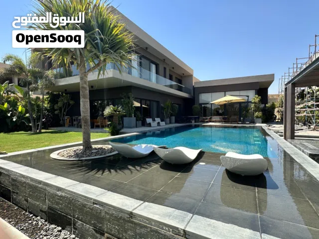Hassan Allam Holding  فيلات متشطبه 310 متر و 640 متر في التجمع الخامس جنب الجامعه الامريكيه