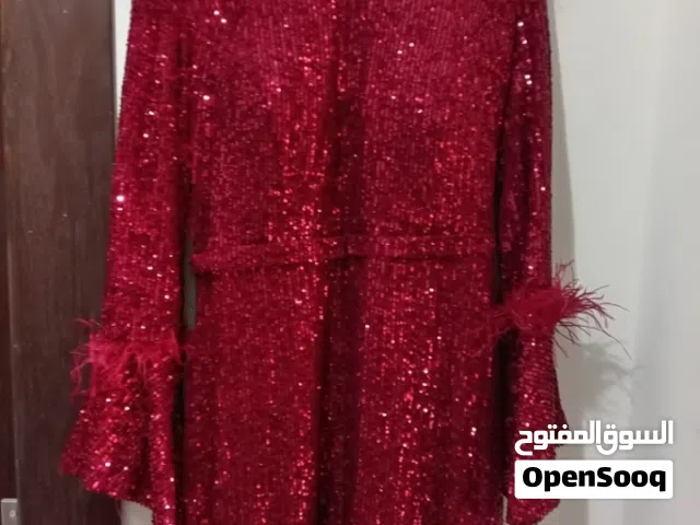 فستان جديد لبسه واحده لون خمري قياس 42 للبيع ب10 دنانير