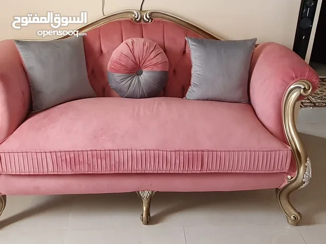 طقم كنب لون سكني ووردي