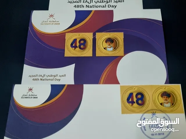 العيد الوطني 48 المجيد مجموعة متكونه من ملف، ومغلف وبطاقة