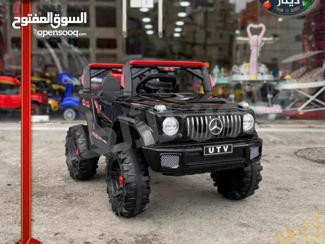 سيارة شحن من عمر 1 الي 6 سنوات 12 فولت 4 ماتور  و هزاز و شاحن و موسيقى من المصنع مباشره