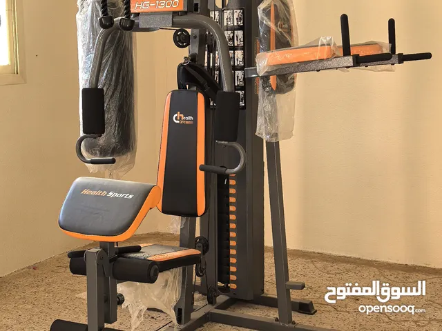 جهاز رياضي كبير متعدد التمارين وسير كهربائي