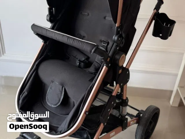 عربة اطفال شبه جديدة